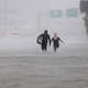 Walking through the floodwaters in Houston.